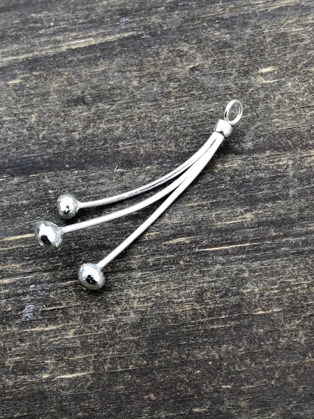 Jos : hanger zilver. Eigen ontwerp