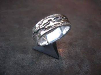 zilver en goud. Trouwring